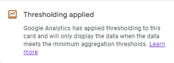 The thresholding notice that appears in GA4 reports