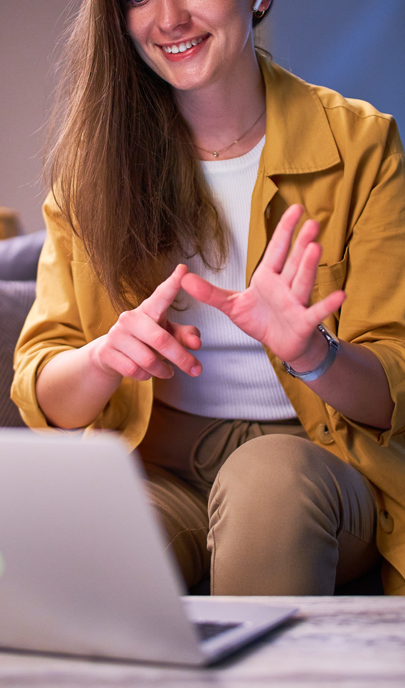 A person using American Sign Language (ASL)